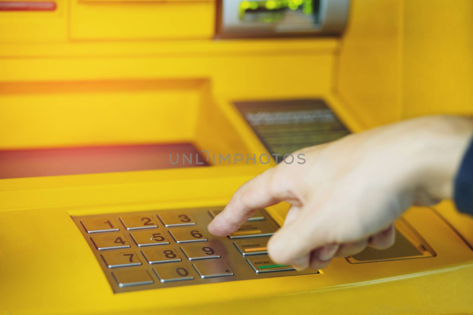 Press the money the password. ATM machine Put your hands off protect Secret code password withdraw.