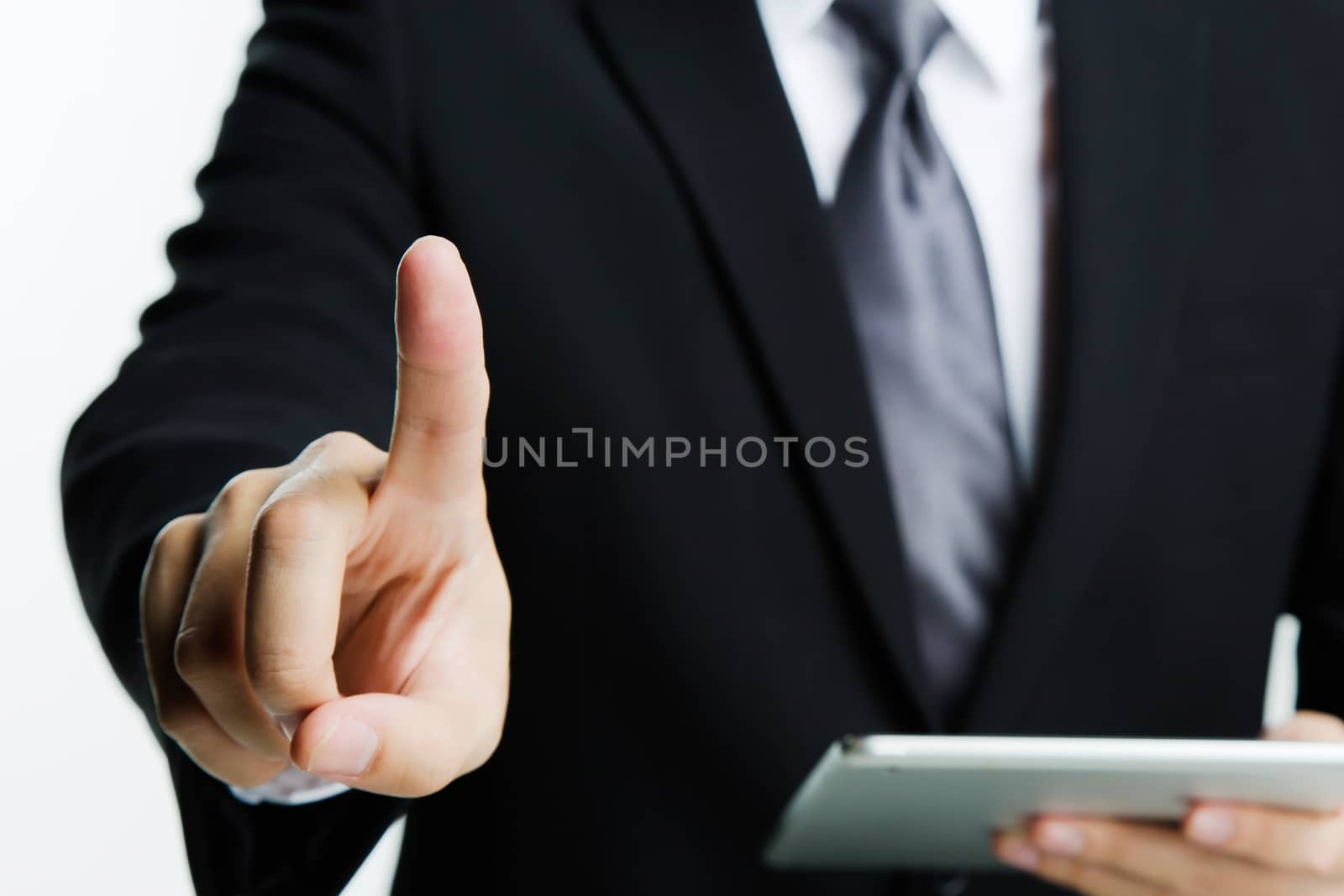 Young male hand touching, pressing modern button and hold laptop. Isolated on White. Business technology concept. by boytaro1428@gmail.com