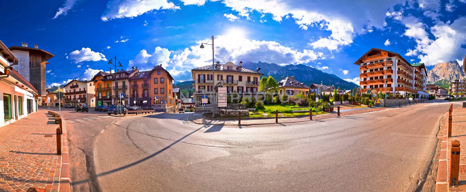 Cortina D' Ampezzo street and Alps peaks panoramic view by xbrchx