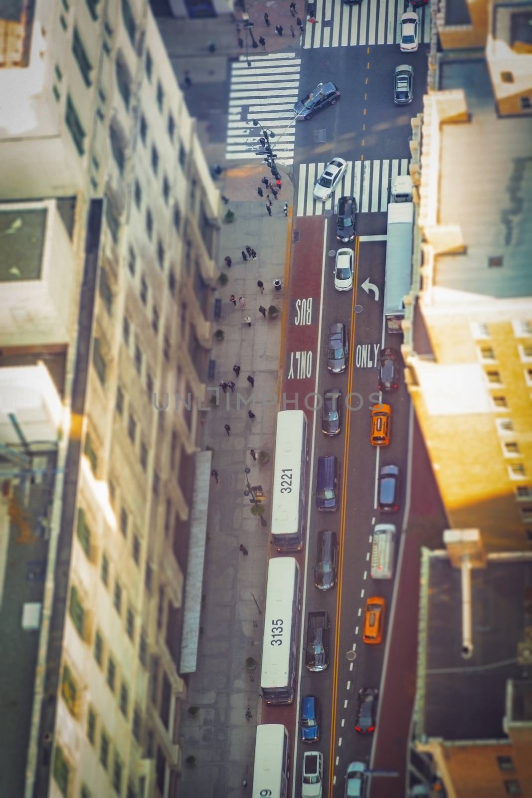 aerial view of a crowded street in New York. Titl shift effect, blurred