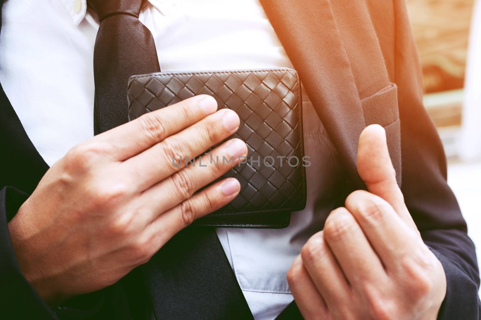 man hand wallet and money