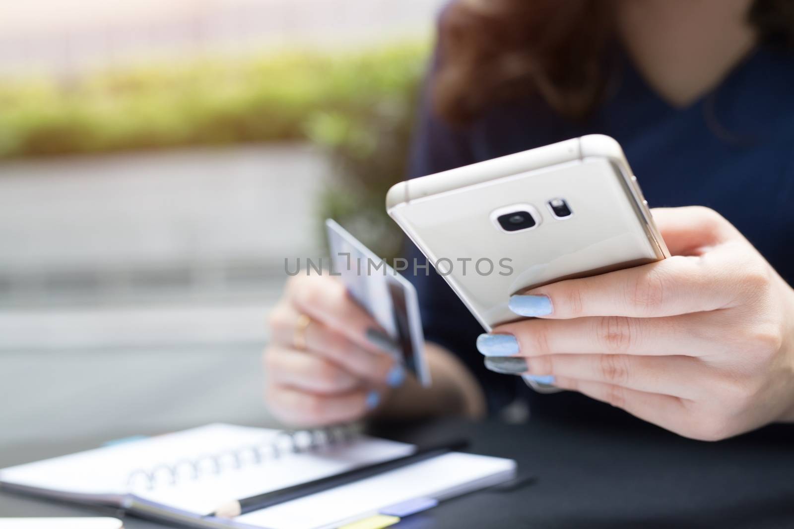 Women use credit cards to shop online.