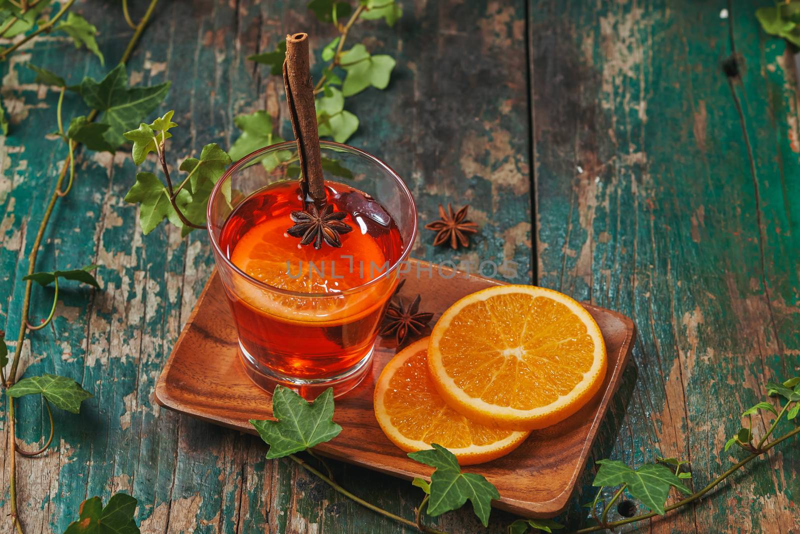 Christmas mulled wine on a rustic wooden table. Holidays concept by makidotvn