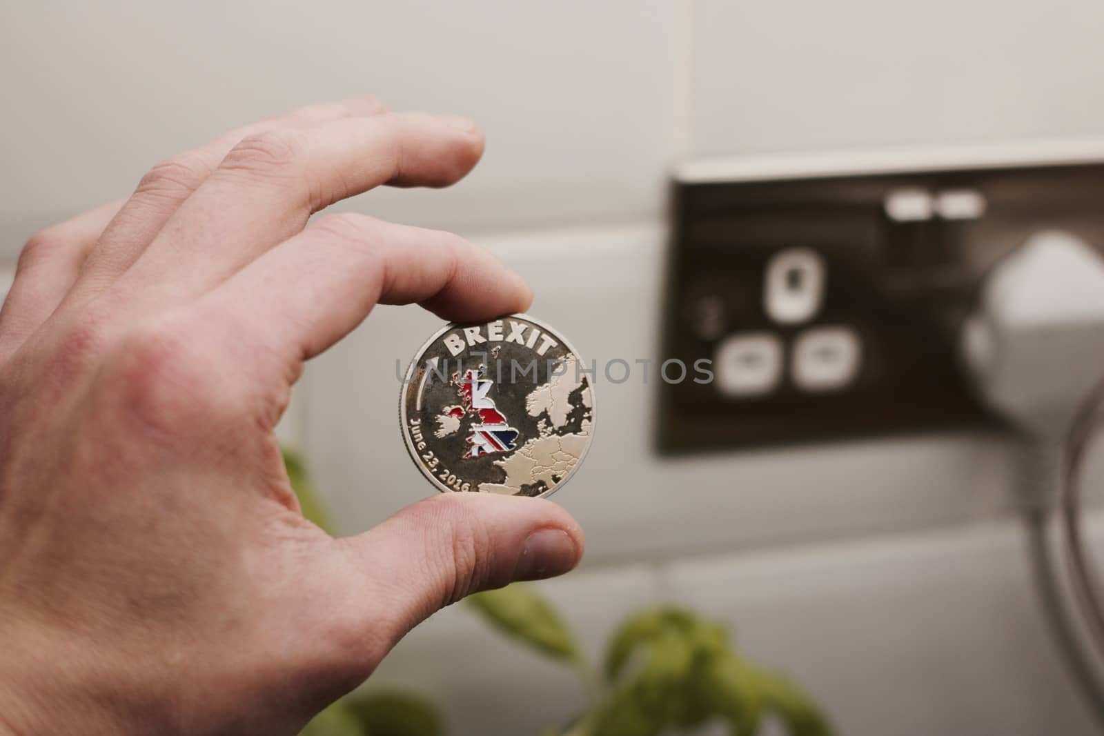 Physical metal brexit coin with map of england. Brexit concept. Europe leaving.