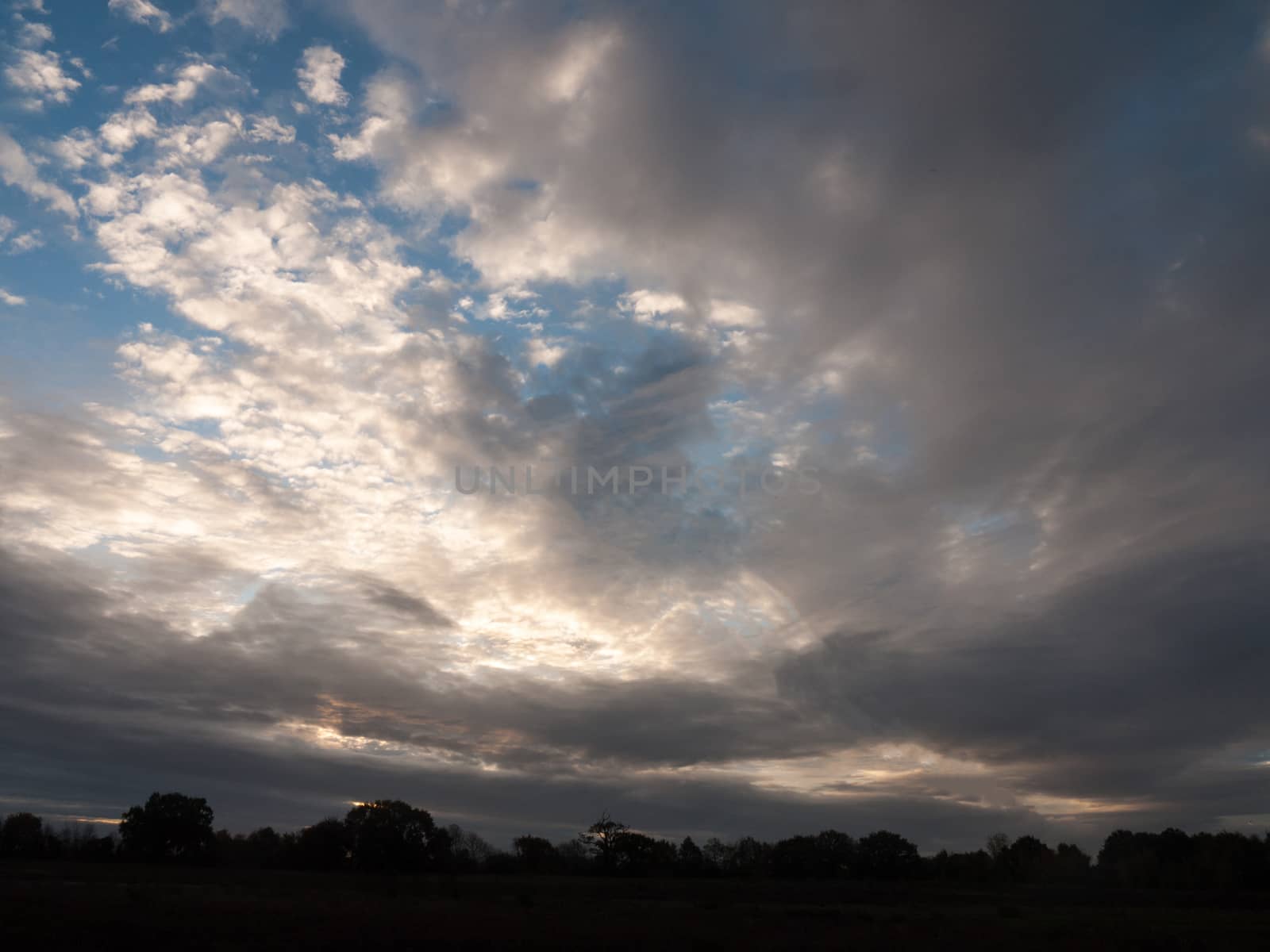 stunning dramatic morning cloudy blue sky overhead space; essex; england; uk