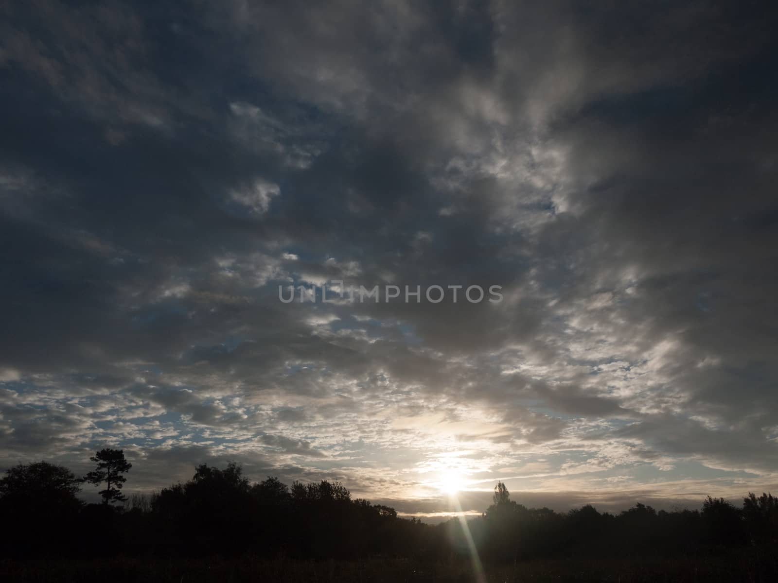 stunning dramatic morning cloudy blue sky overhead space; essex; england; uk