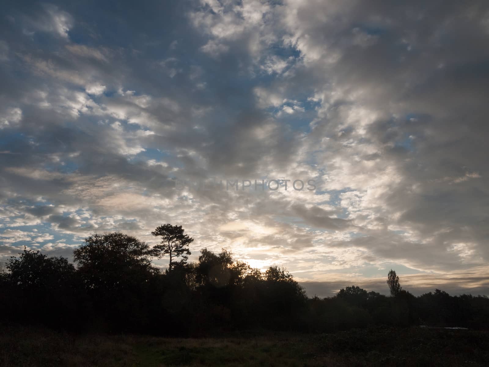stunning dramatic morning cloudy blue sky overhead space; essex; england; uk
