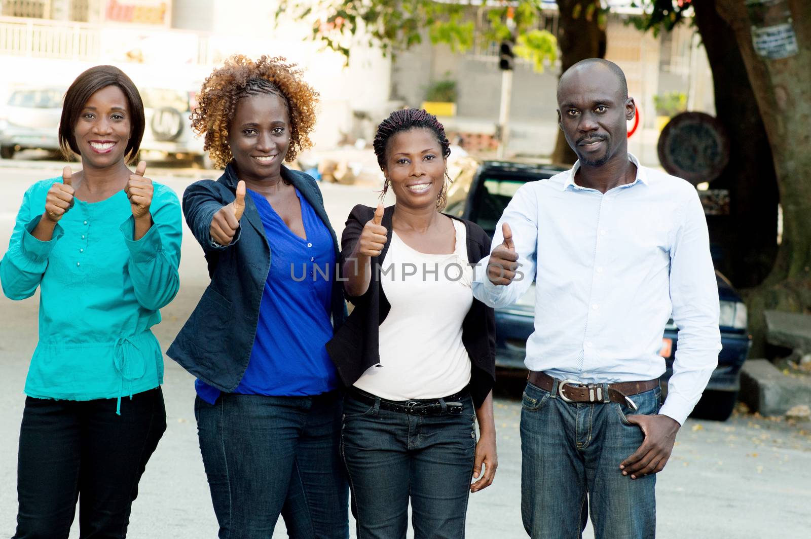 This group of people arrested in the street smiling and happy to do good business.