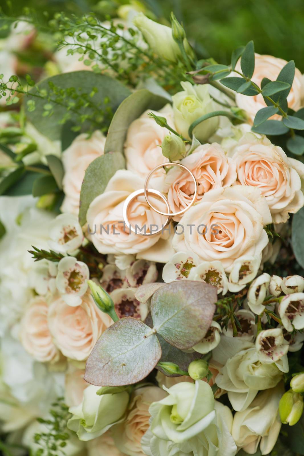 Beautiful wedding bouquet and Beautiful wedding rings.