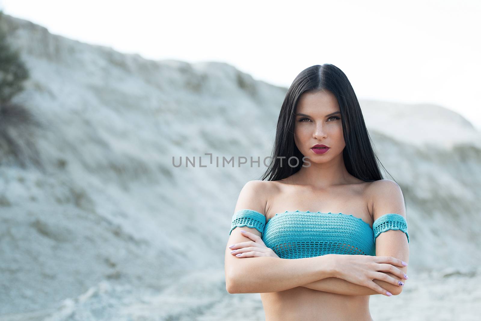 Girl in a swimsuit on the beach