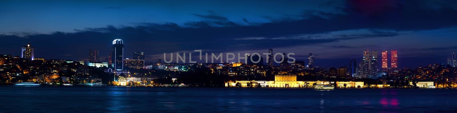 Panorama of Istanbul cityscape and Bosphorus at night, Turkey