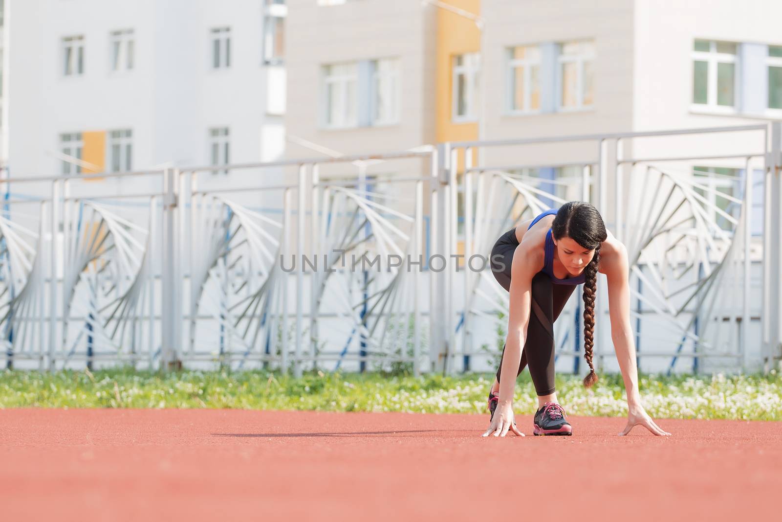 The girl warming up before sports by 3KStudio