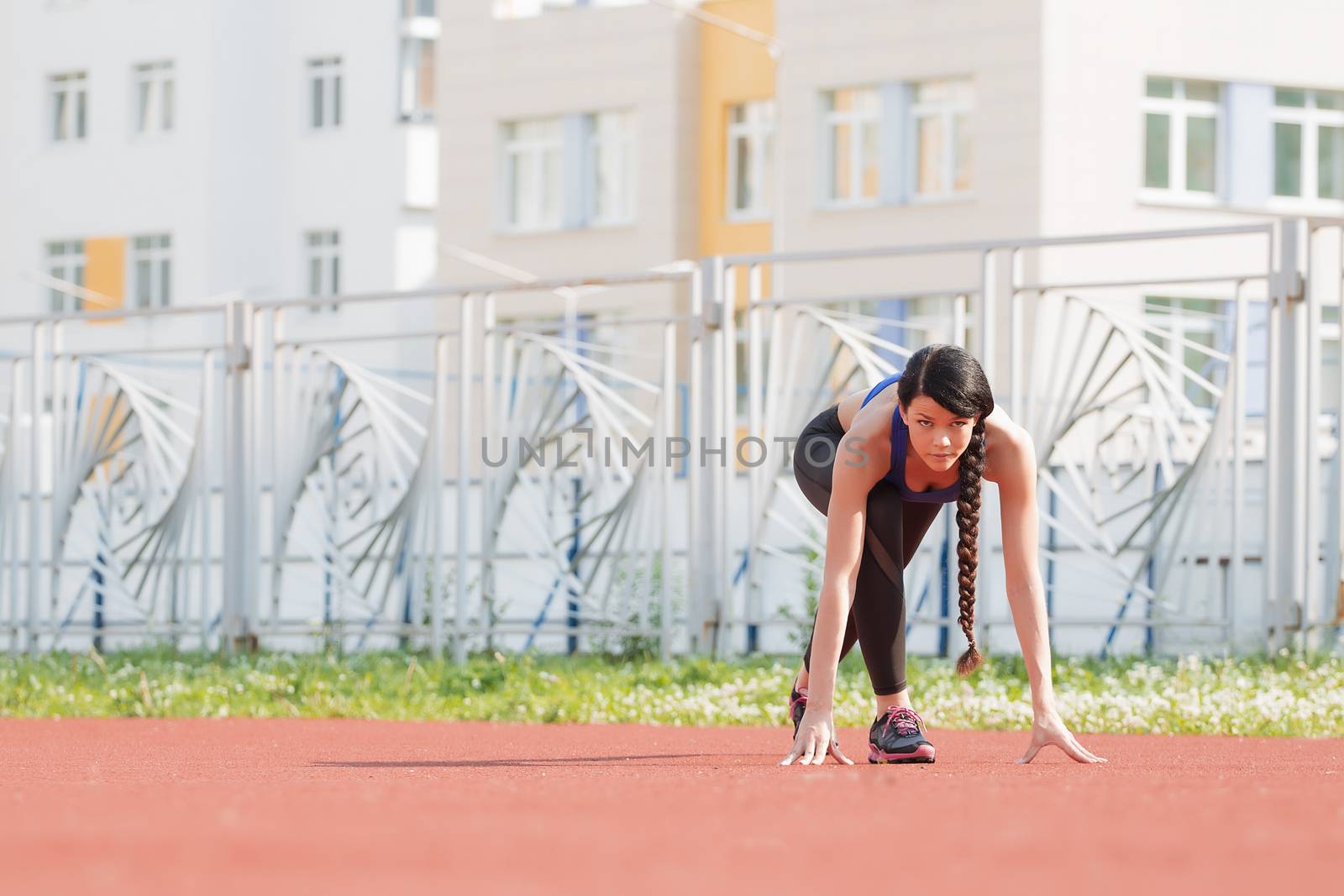 The girl warming up before sports by 3KStudio