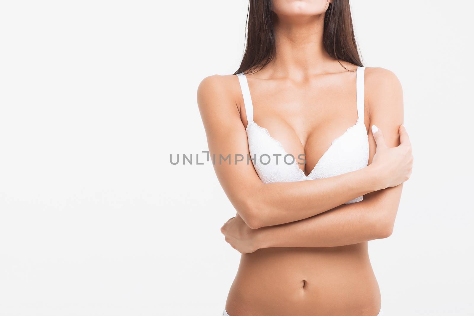 Perfect body young woman on a white background in sexy lingerie by 3KStudio