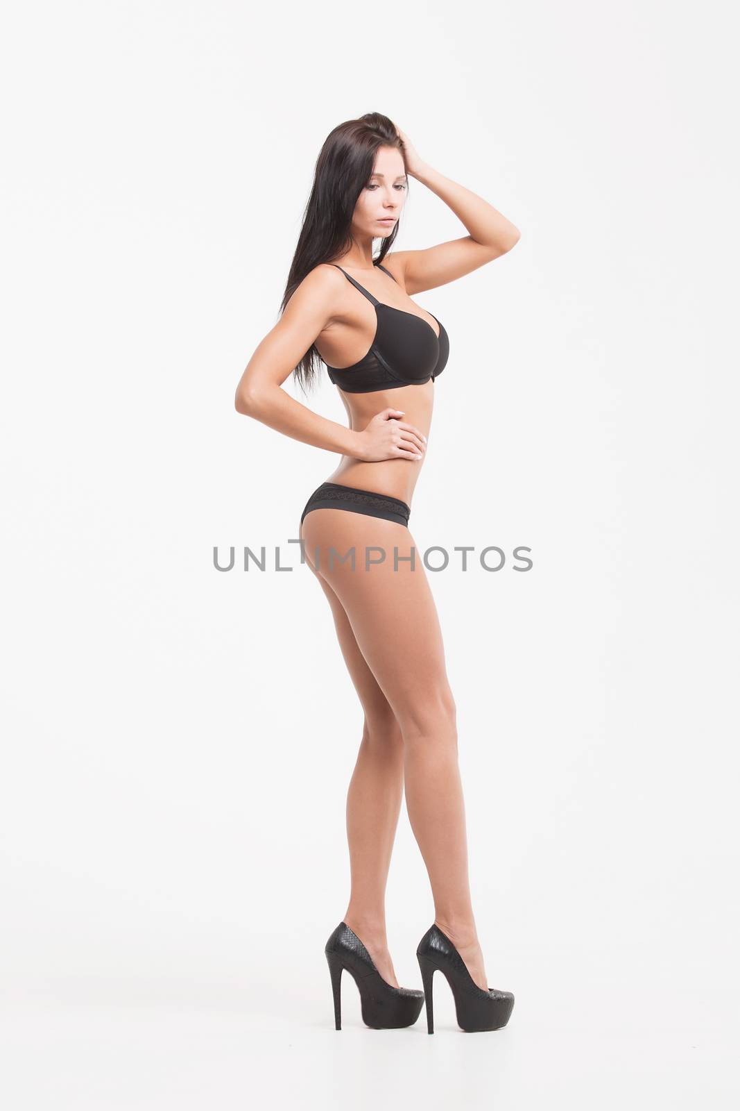 Girl in lingerie on white background by 3KStudio