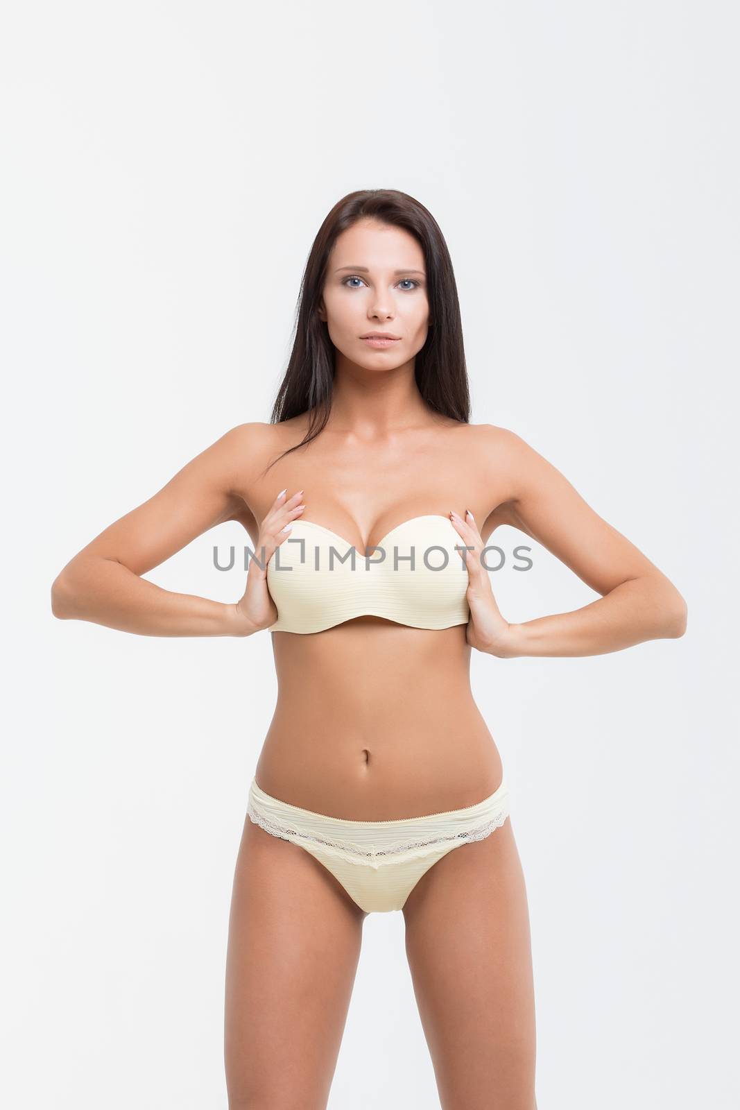 Sexy woman on white background. Perfect womans body.