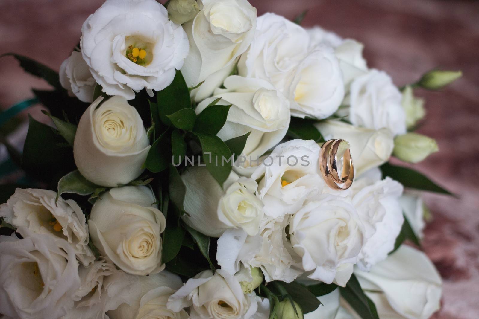 Beautiful wedding bouquet and Beautiful wedding rings.