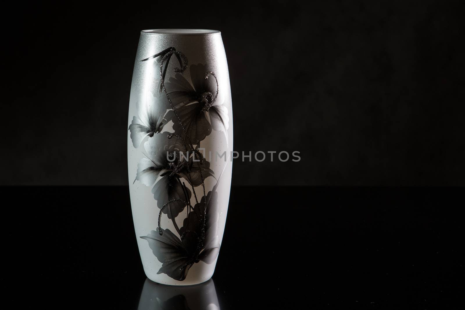 glass vase on black background