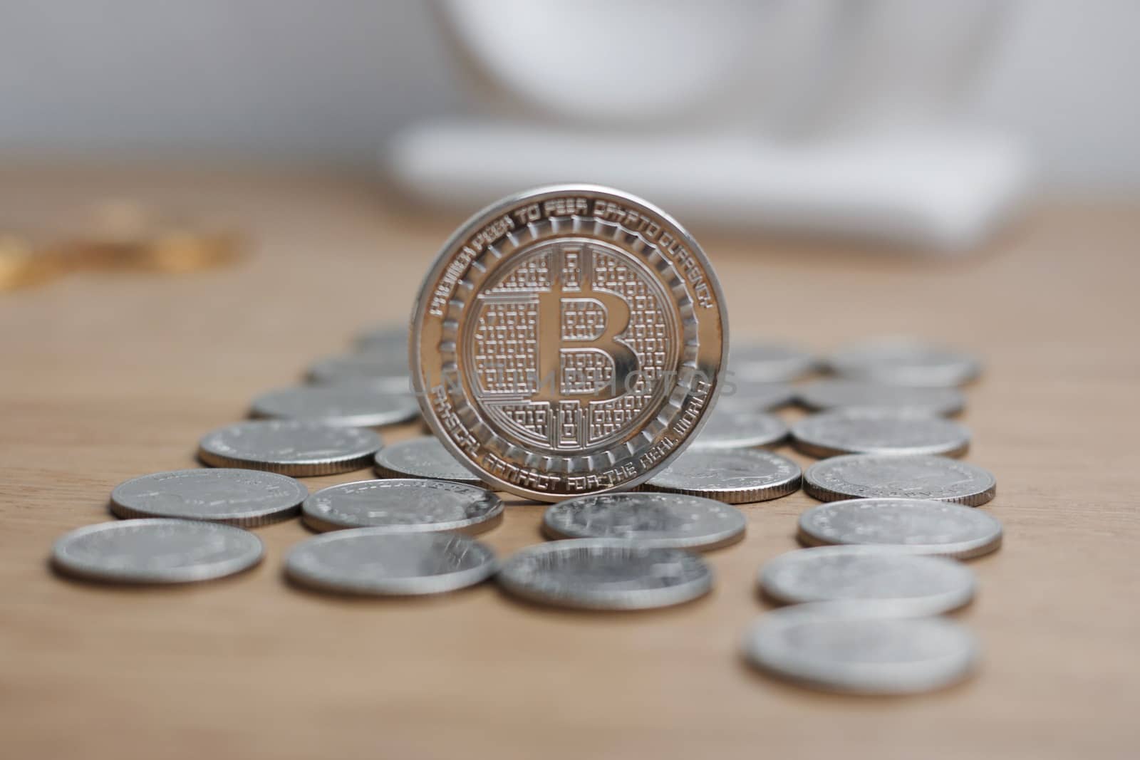 Digital currency physical metal bitcoin coin. Cryptocurrency mining concept.