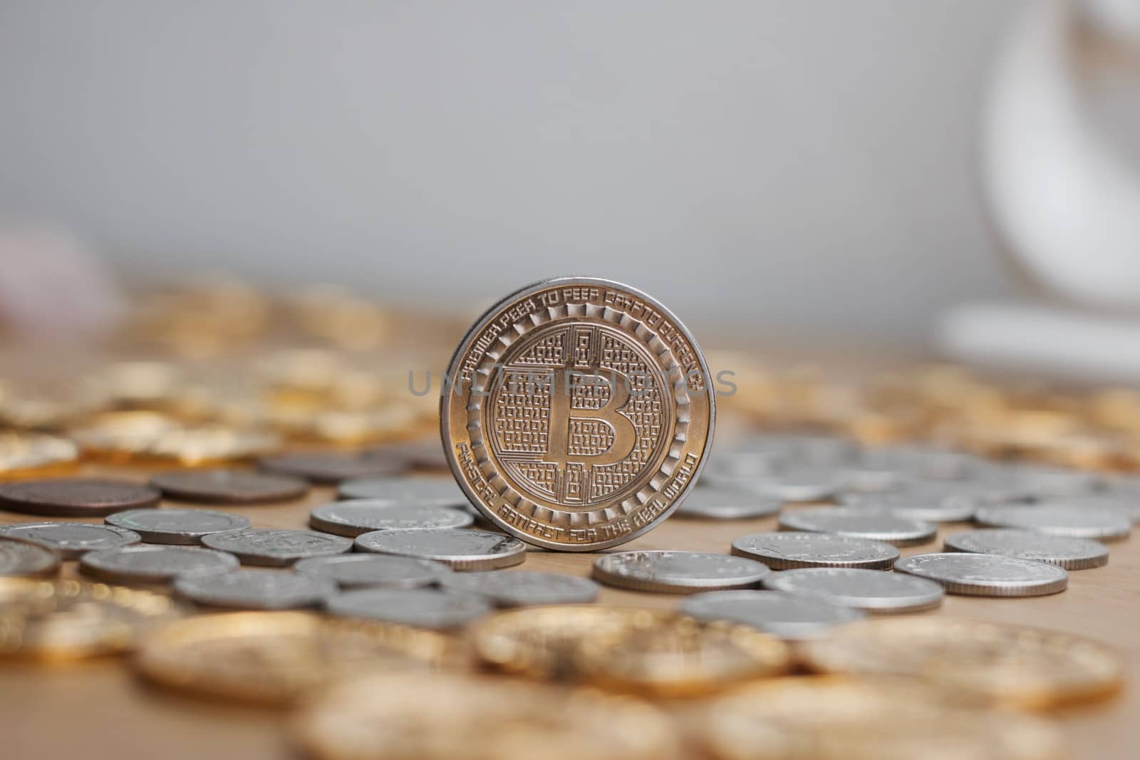 Digital currency physical metal bitcoin coin. Cryptocurrency mining concept.