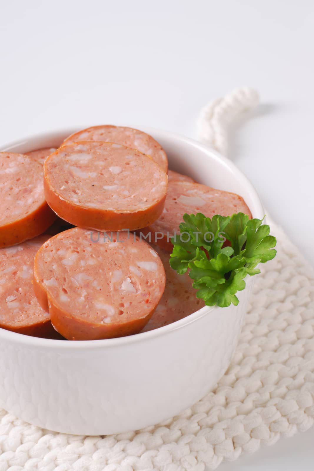 sliced pork sausage by Digifoodstock