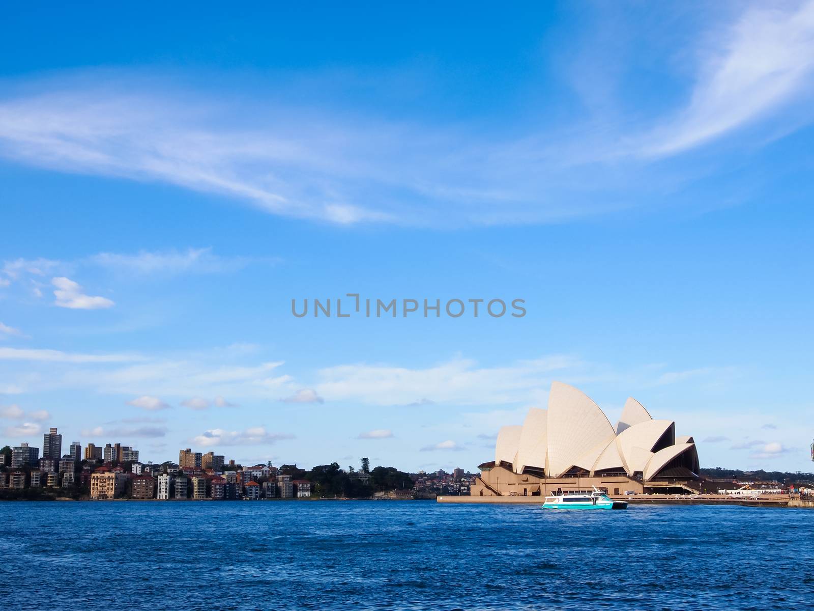 Sydney Opera House , boat and Harbour viewed ,Sydney Australia