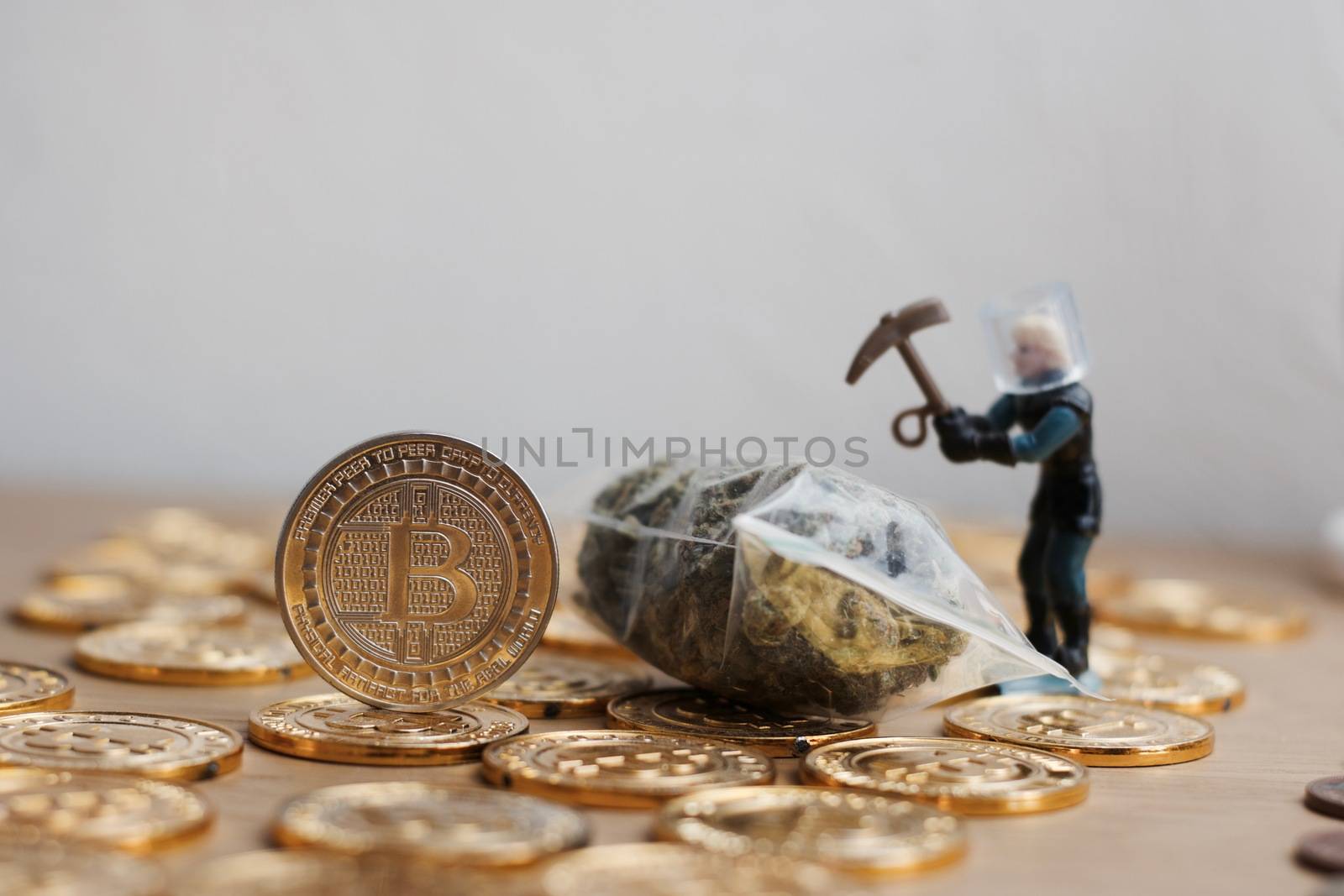 Digital currency physical bitcoin coin. Gold background coins concept.
