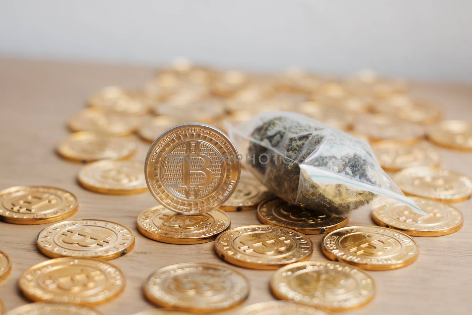 Digital currency physical bitcoin coin. Gold background coins concept.