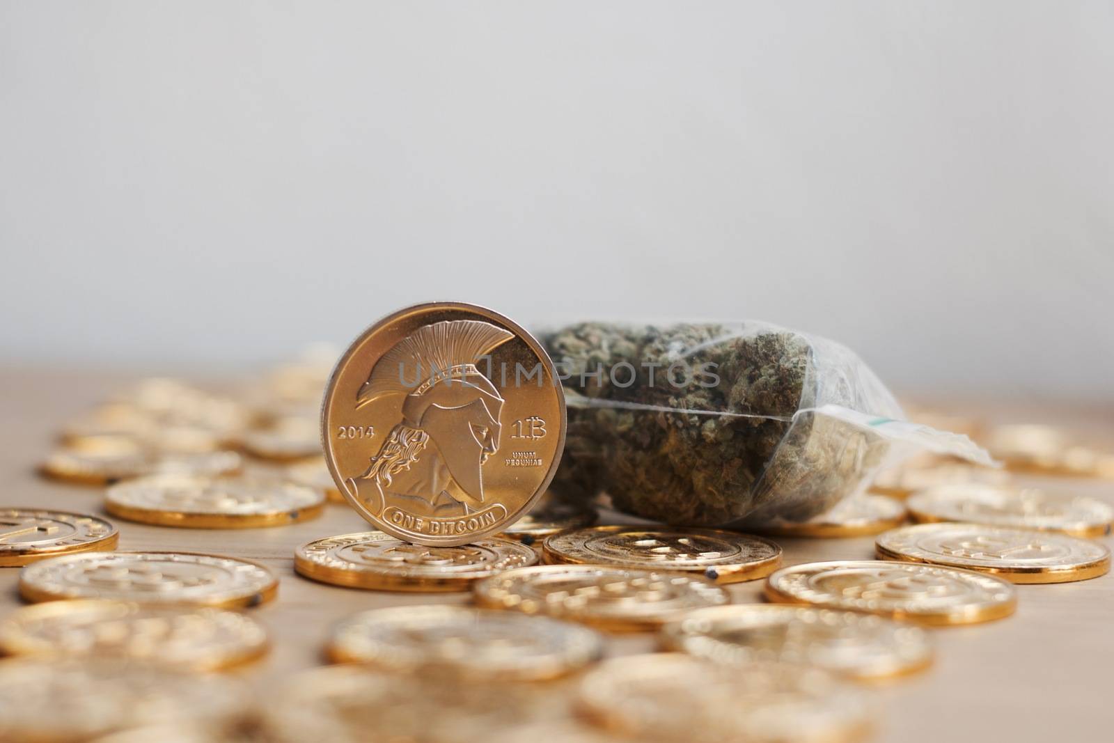 Digital currency physical bitcoin coin. Gold background coins concept.