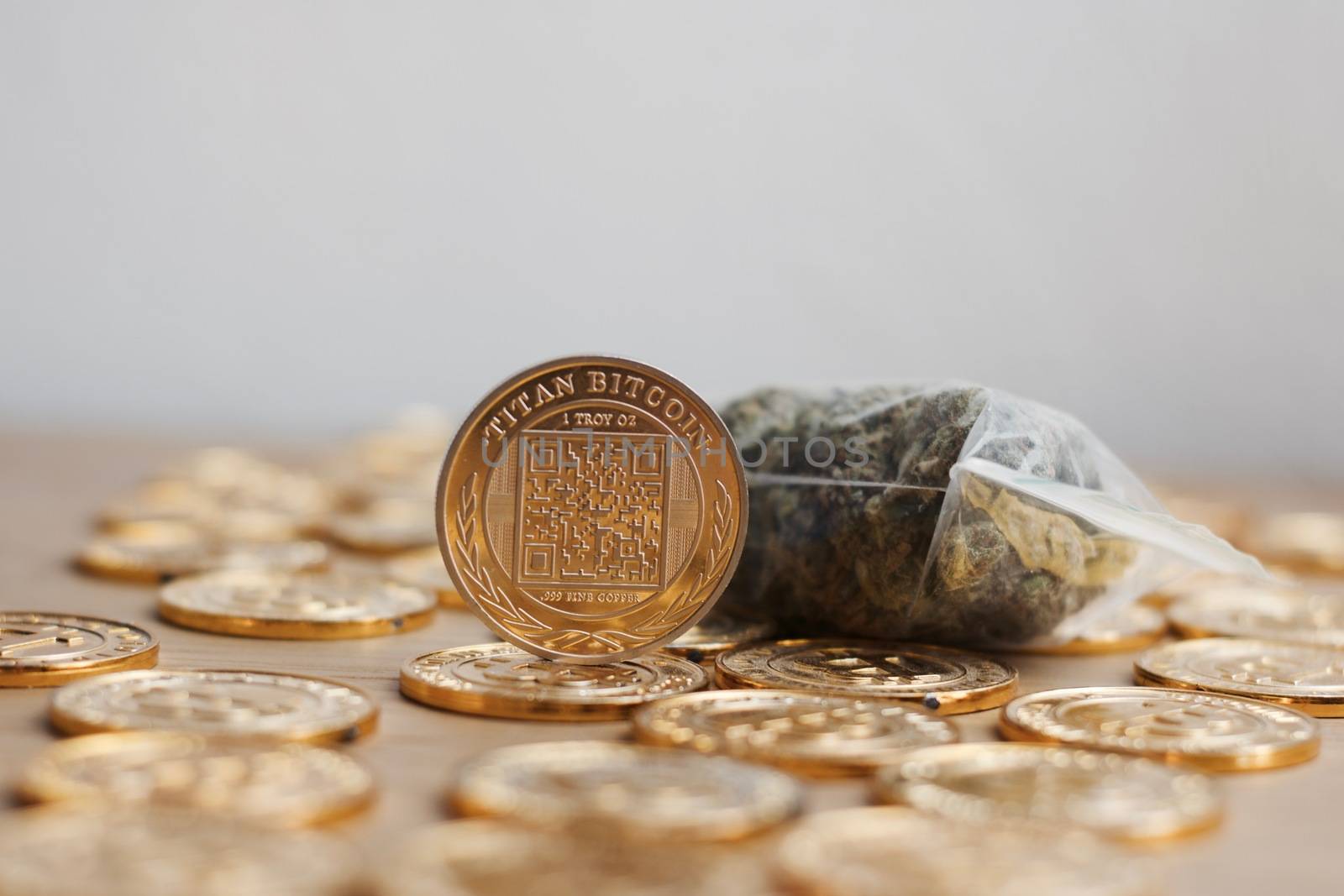 Digital currency physical bitcoin coin. Gold background coins concept.