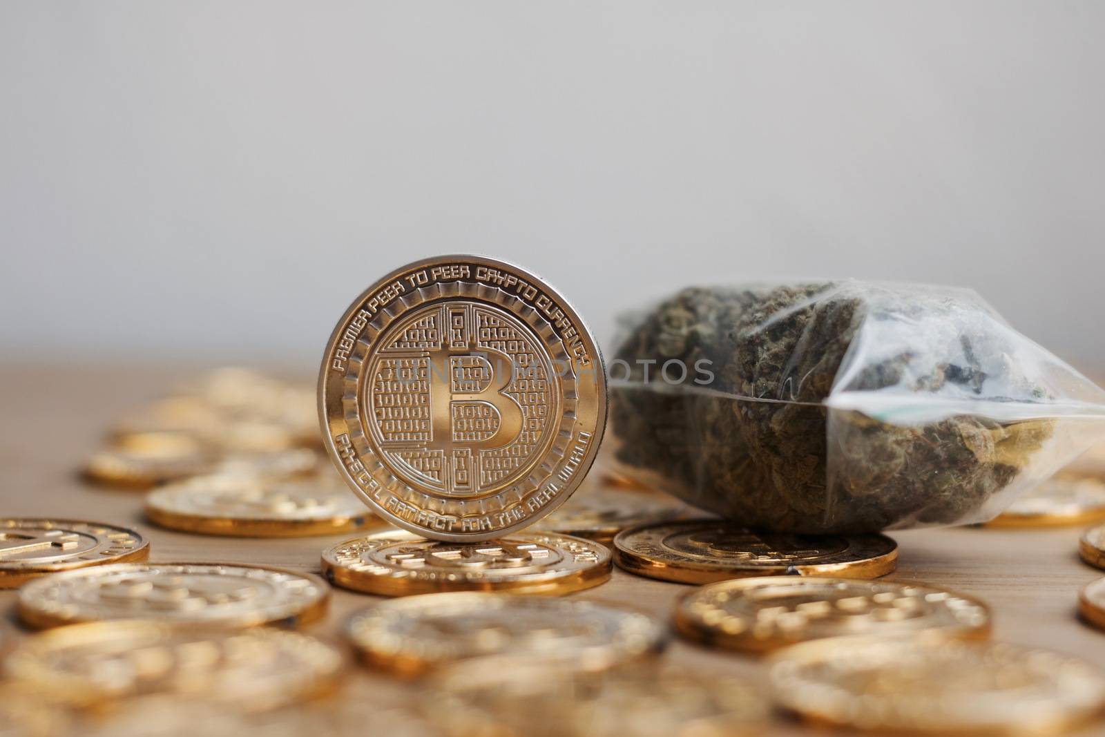 Digital currency physical bitcoin coin. Gold background coins concept.