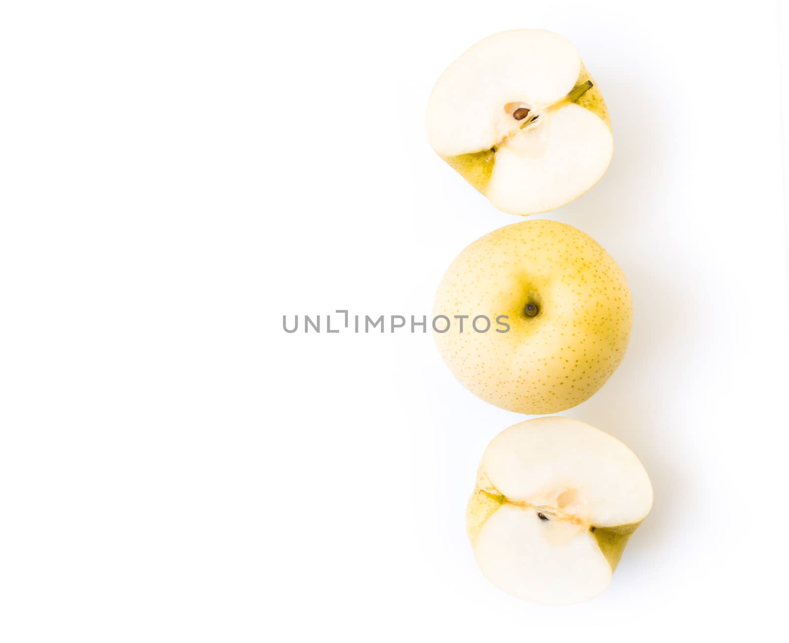 Closeup top view hinese pear fresh fruit with slices on white background, selective focus