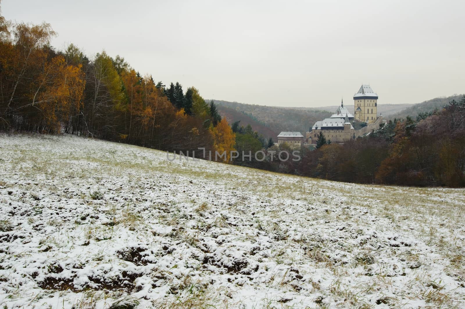 View of a snowy winter landscape with a castle Karlstejn