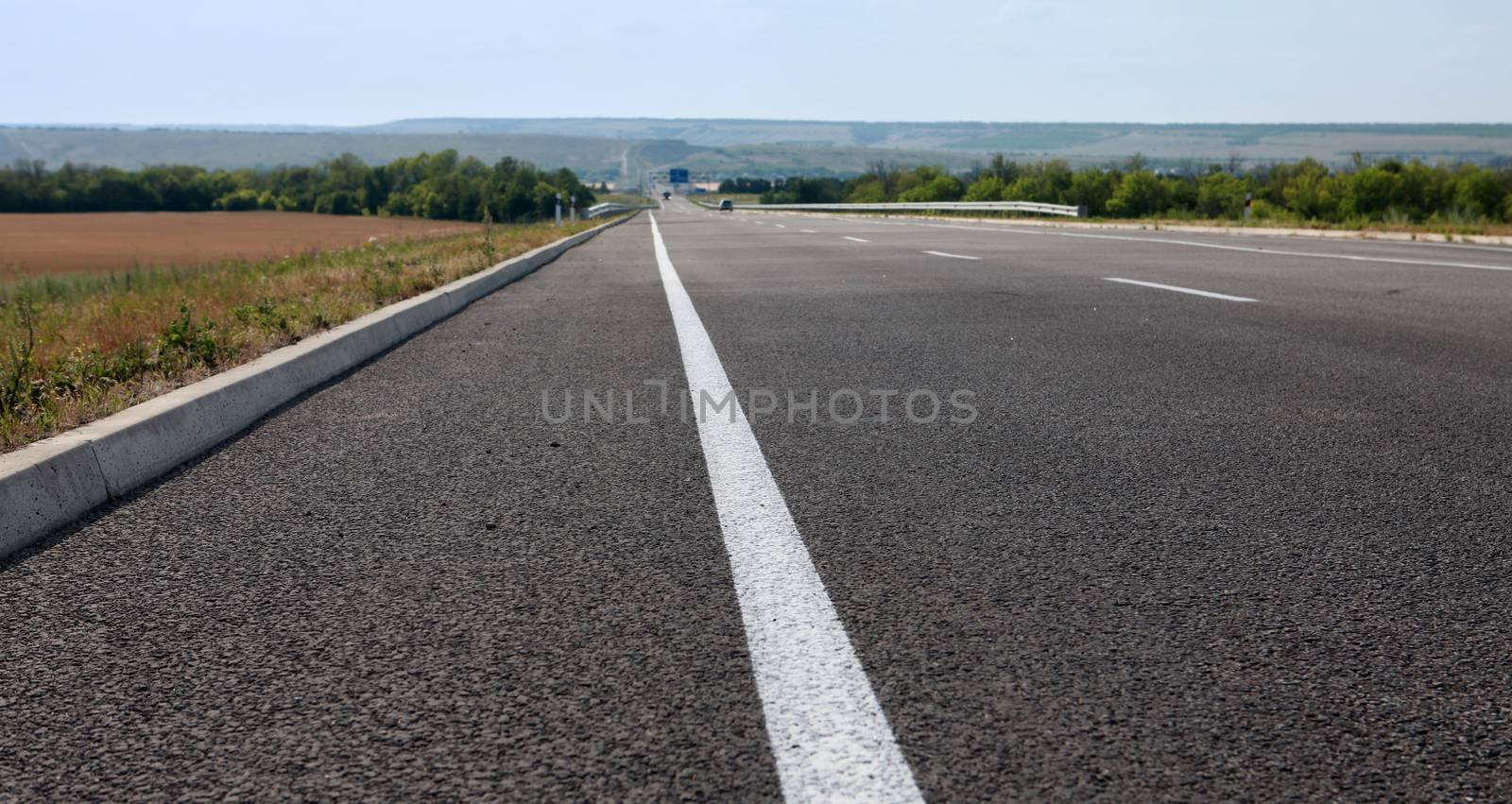 asphalt road for fast driving by ssuaphoto