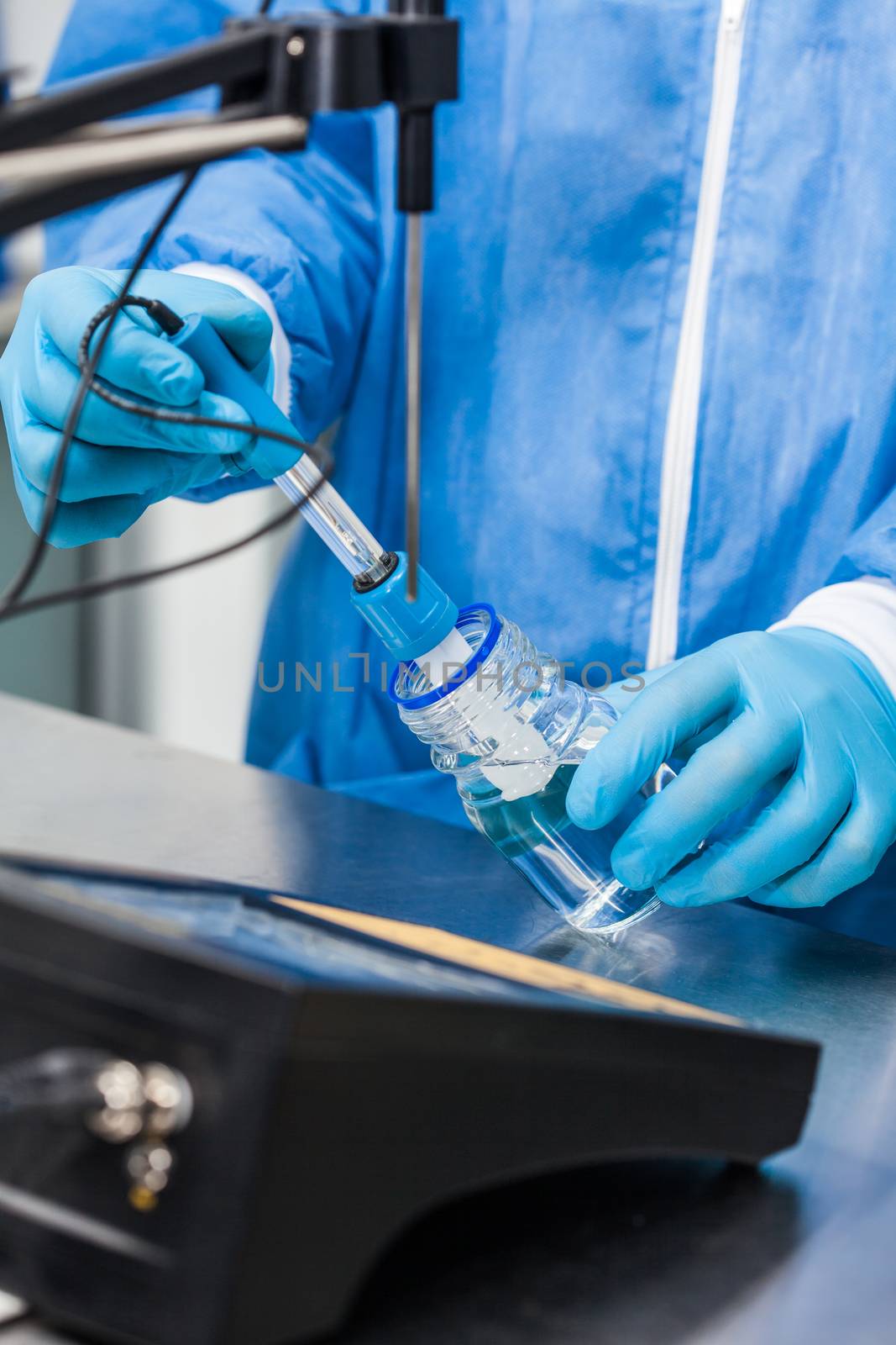 Scientist using a ph meter at laboratory