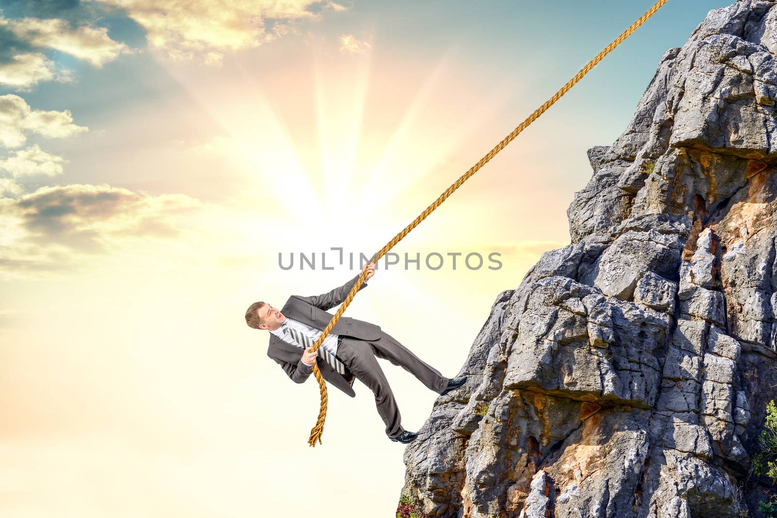 Businessman climb a mountain. Achievement business goal concept