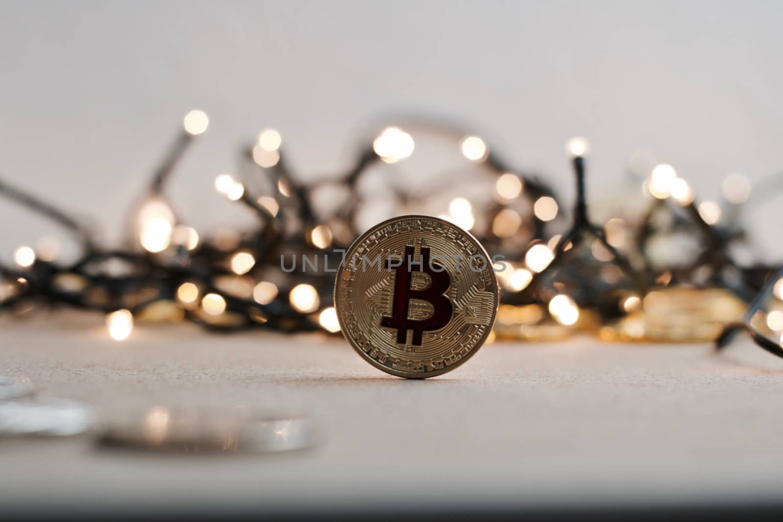 Digital currency physical metal bitcoin coin on the christmas concept.