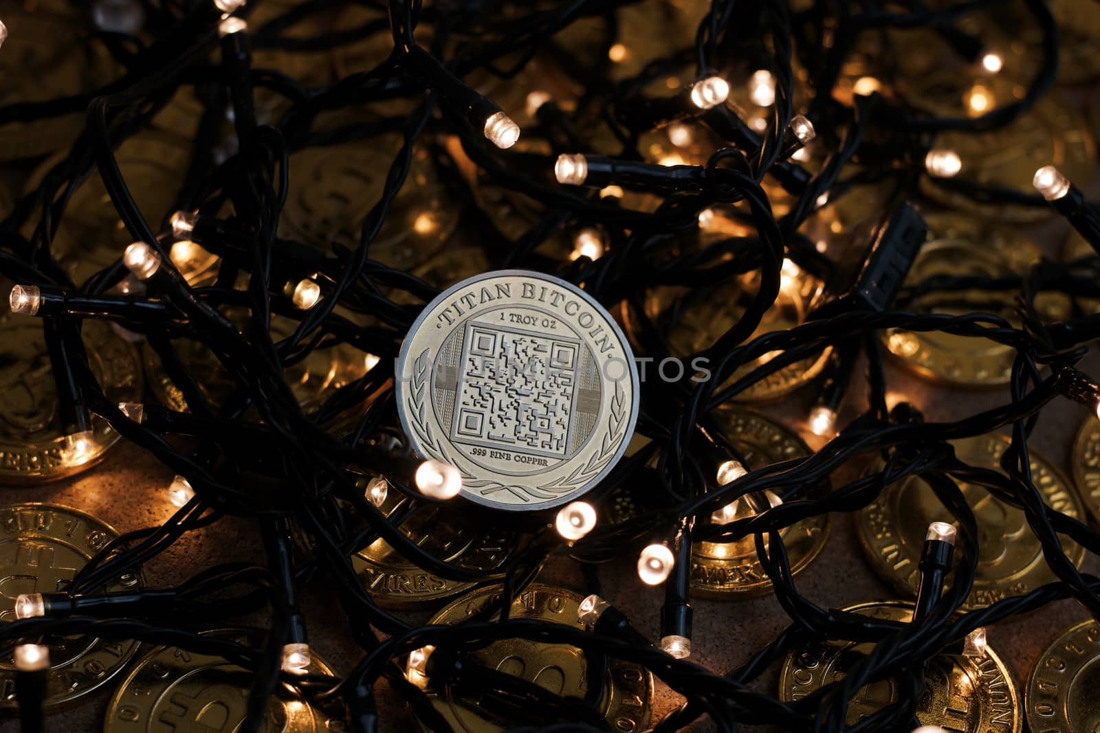 Digital currency physical metal bitcoin coin on the christmas concept.
