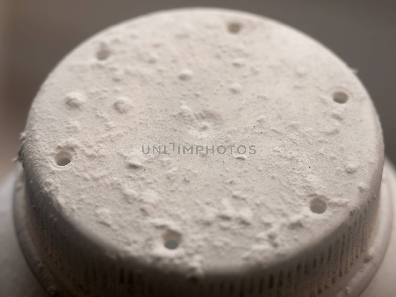close up of talcum powder bottle top dirty white; essex; england; uk