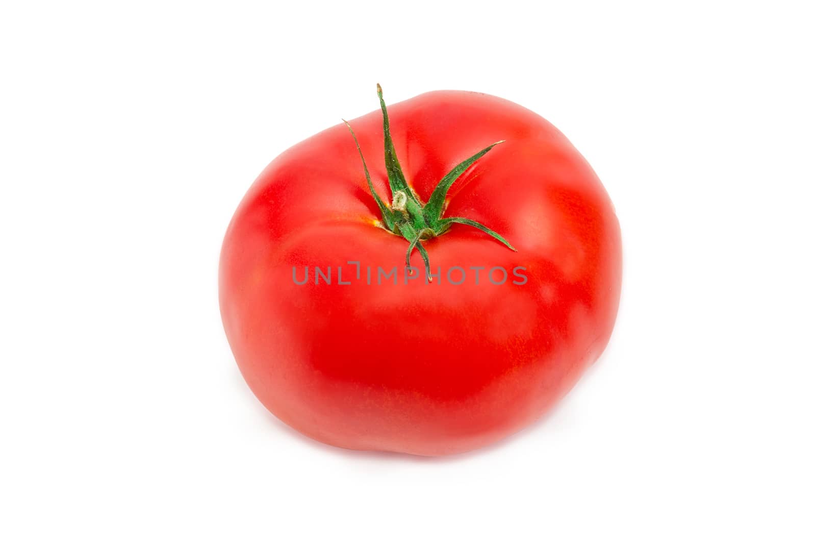 One big ripe red tomato closeup on a light background
