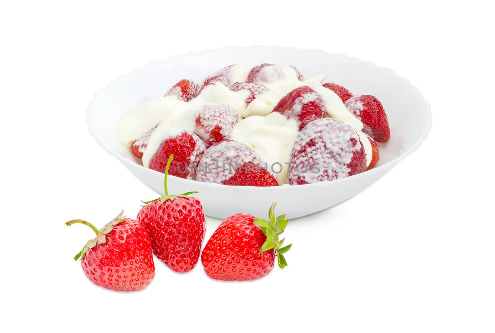 Strawberry dessert with whipped cream in white bowl and several fresh strawberry berries beside on a light background
