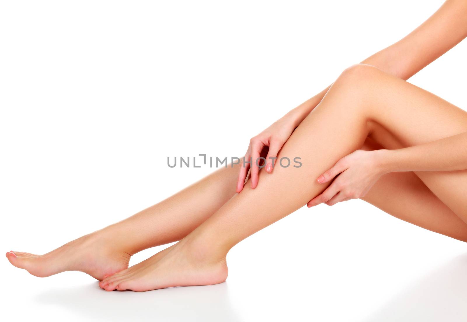 Woman legs on white background, isolated