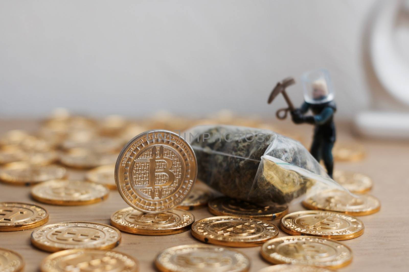Digital currency physical bitcoin coin. Gold background coins concept.