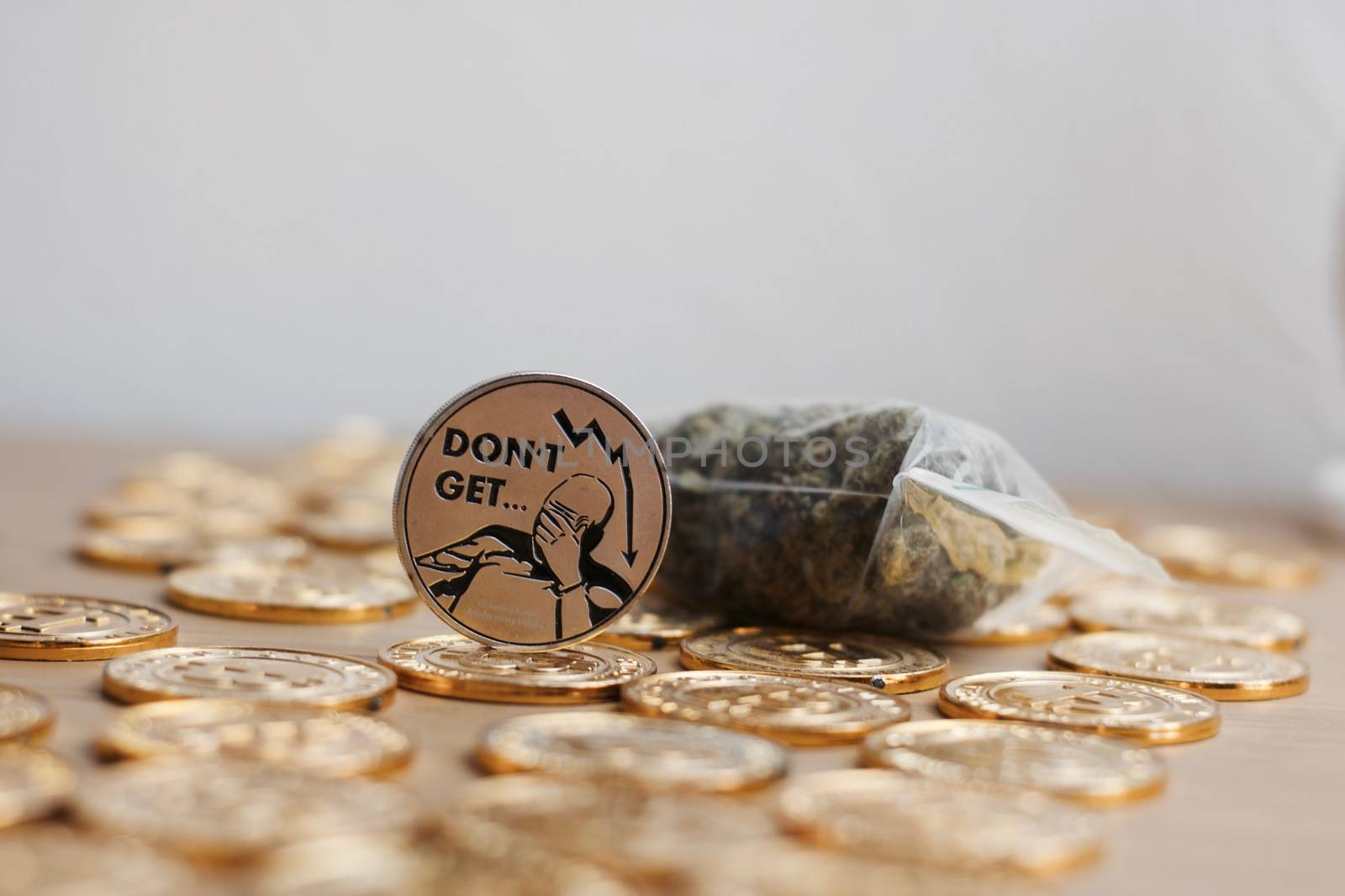Digital currency physical bitcoin coin. Gold background coins concept.