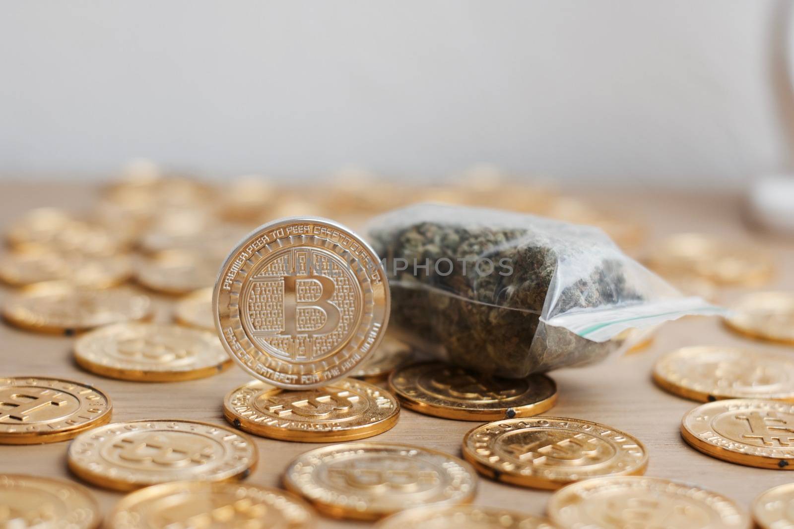 Digital currency physical bitcoin coin. Gold background coins concept.