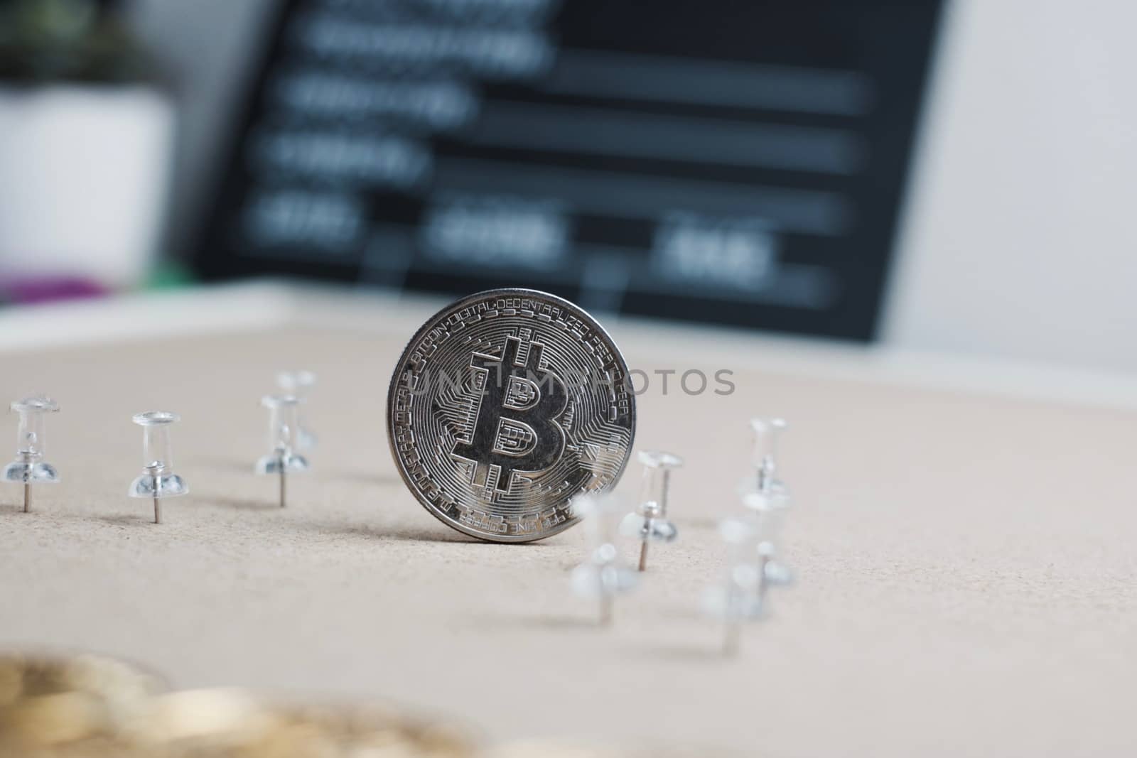 Digital currency physical metal bitcoin coin. Cryptocurrency cinema concept.