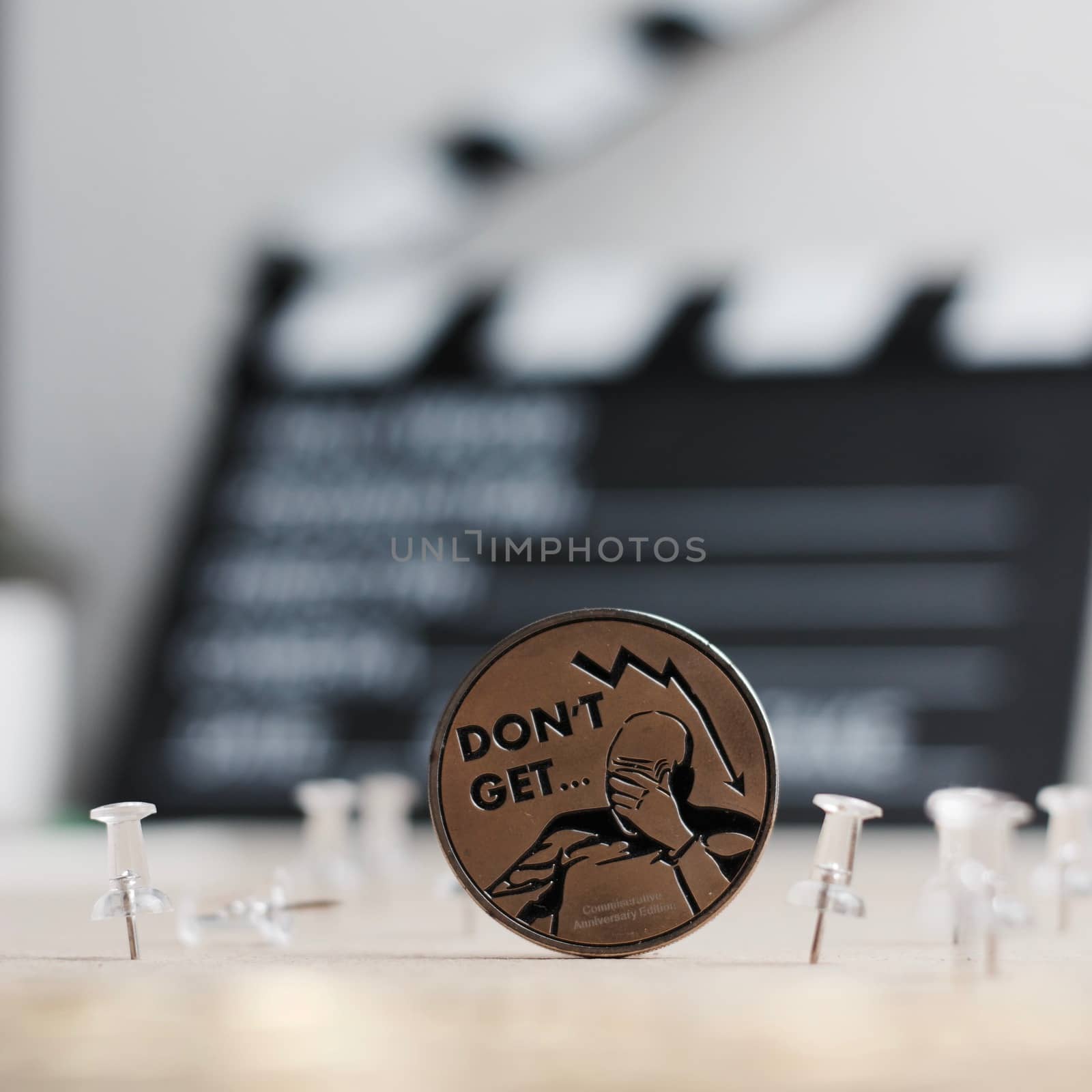Digital currency physical metal bitcoin coin. Cryptocurrency cinema concept.