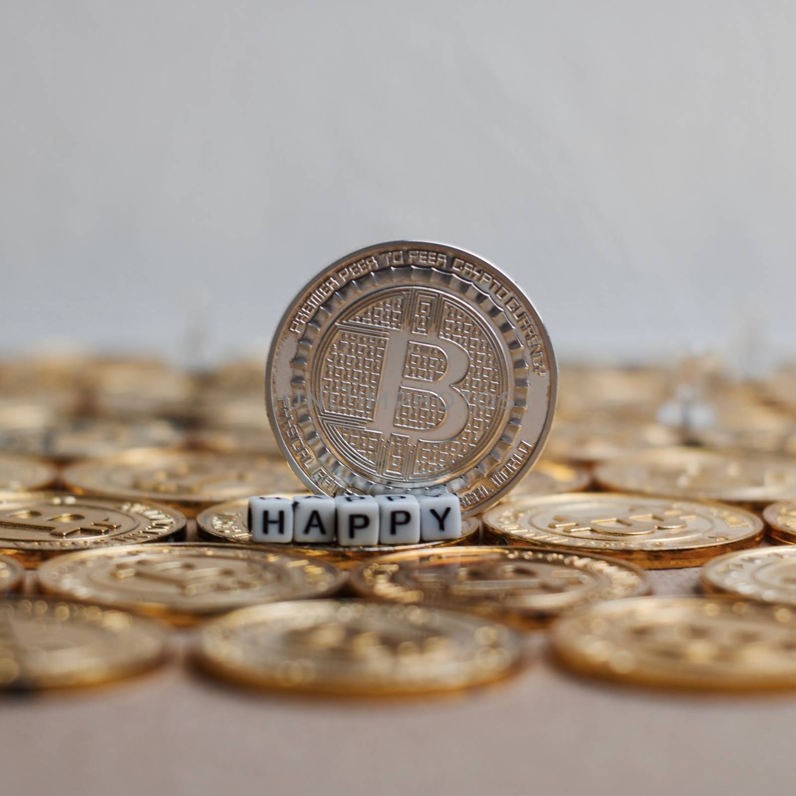 Digital currency physical metal bitcoin coin on the christmas concept.