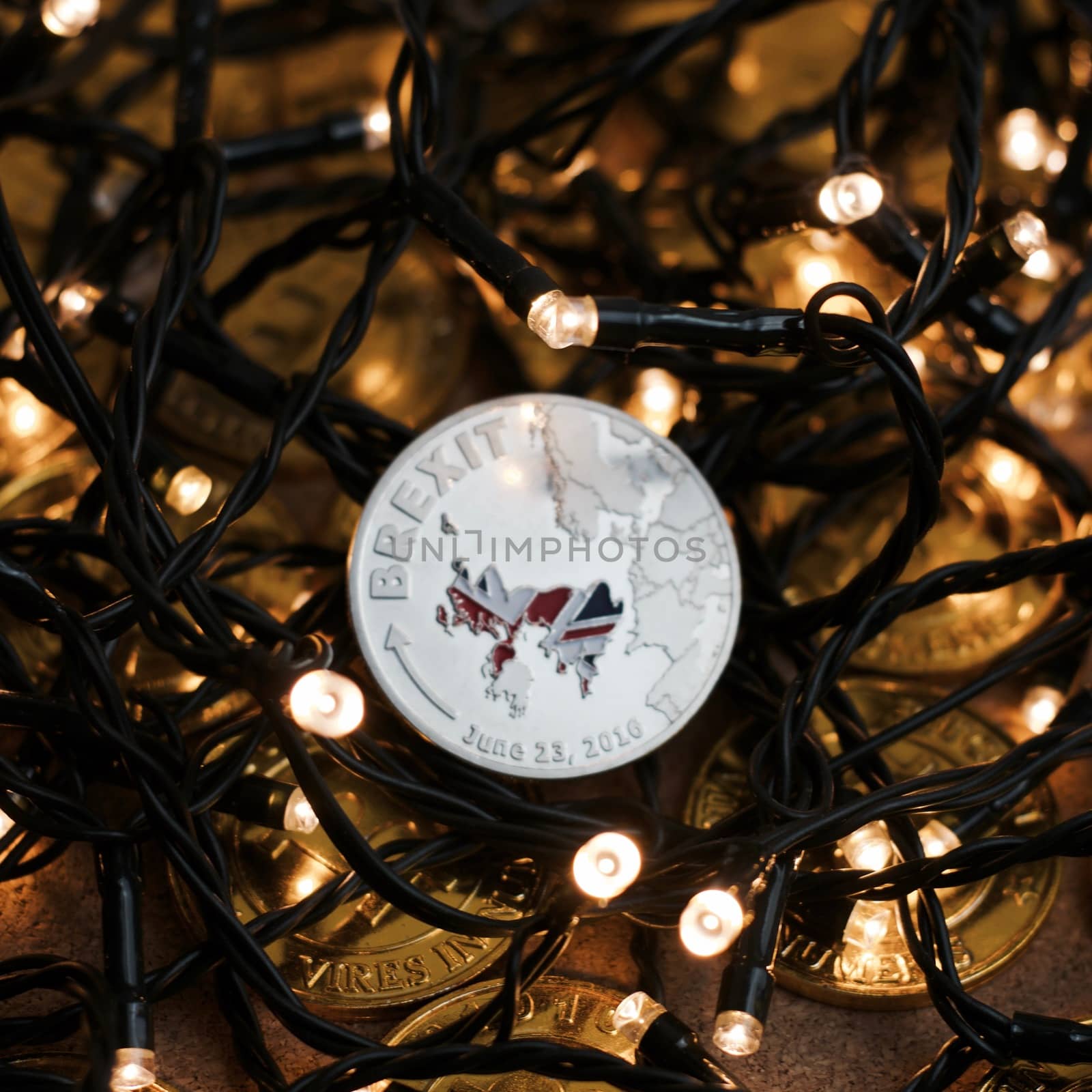 Europe leaving. Article 50 physical brexit coin with british map. Christmas concept.