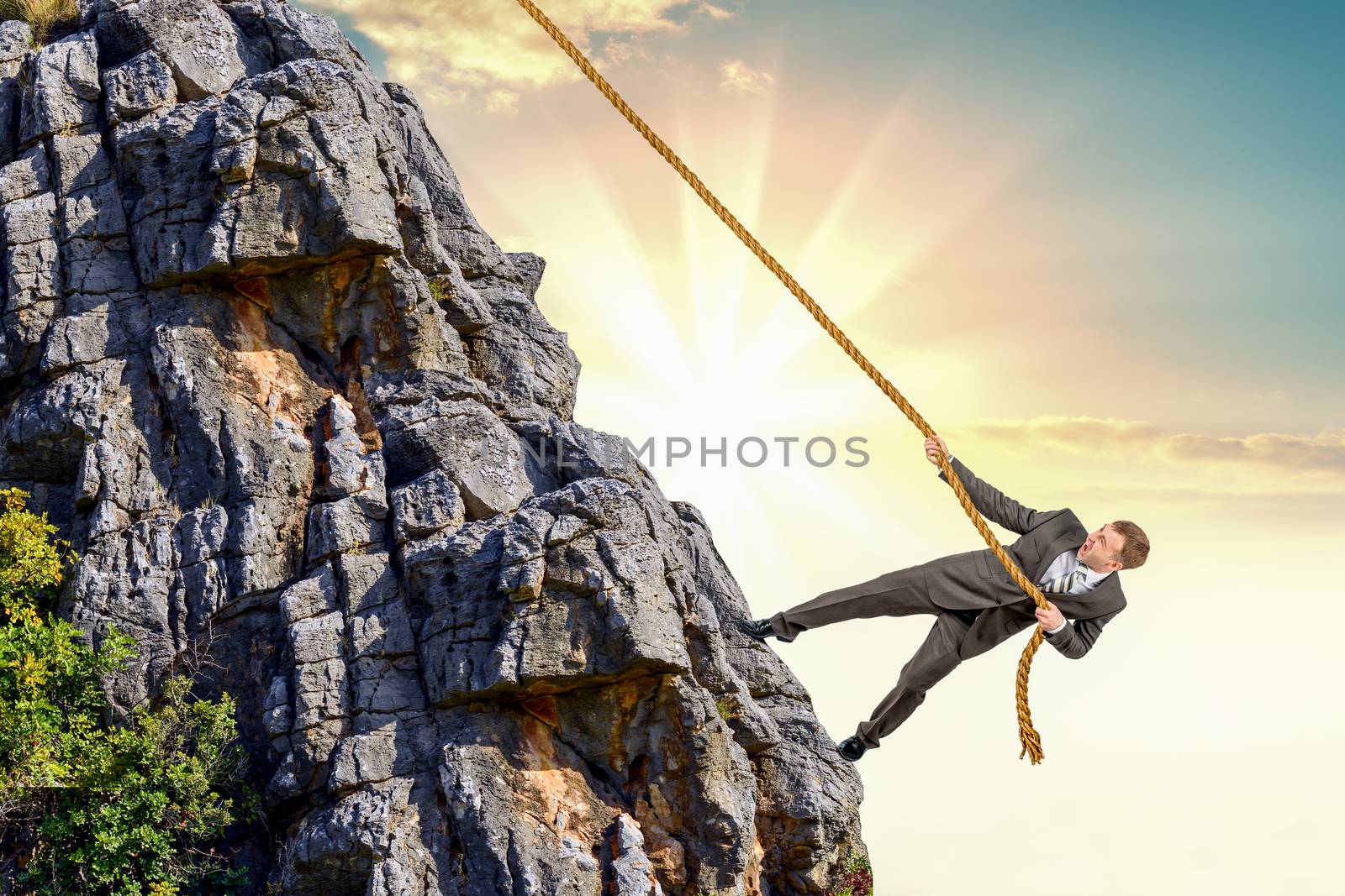 Businessman climb a mountain. Achievement business goal concept